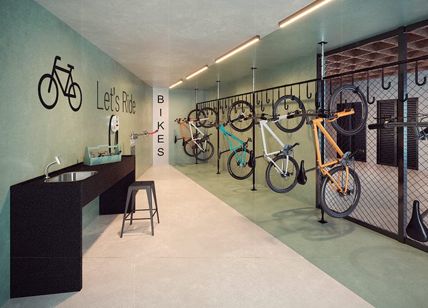 Bicicletário com suportes de parede para bicicletas, bancada de manutenção e pia
