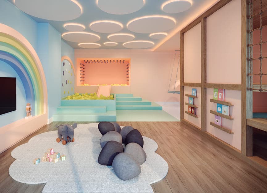 Brinquedoteca com piscina de bolinhas, parede de escalada, arco-íris e prateleira de livros